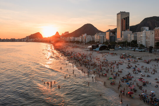 Aerial view of Copacabana beach crowded at sunset, Rio de Janeiro, Brazil