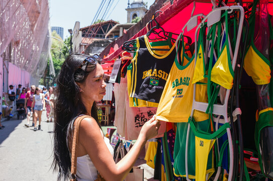 Asian woman at a souvenir shop in Rio de Janeiro, Brazil