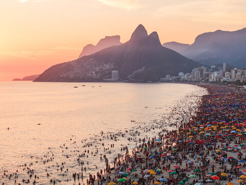 Aerial view of Ipanema beach crowded at sunset, Rio de Janeiro, Brazil
