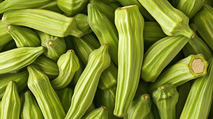 Fototapeta premium Fresh Green Okra Pods, Whole and Raw, Display of Nutritious Natural Okra Harvest for Culinary Use