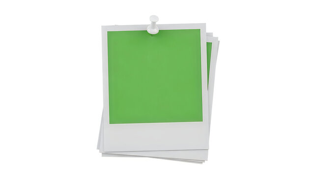 Stack of polaroid photos with green color pinned on top