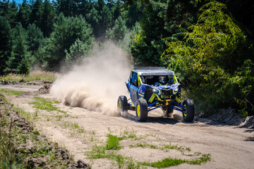 Outdoor activities UTV buggy on dusty track. 4x4, extreme, adrenalin © Antonio