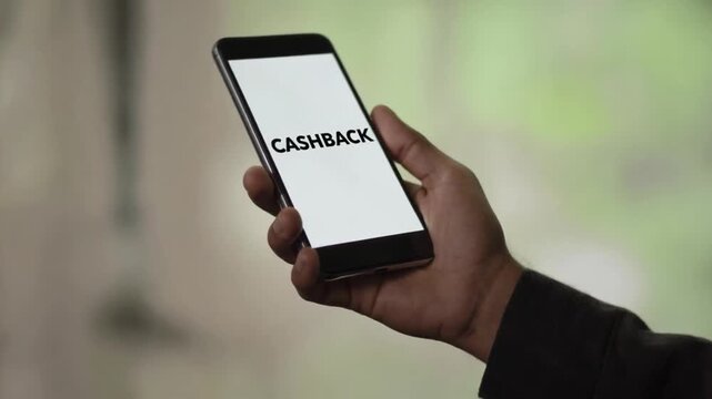 Mobile phone with the text "cashback".