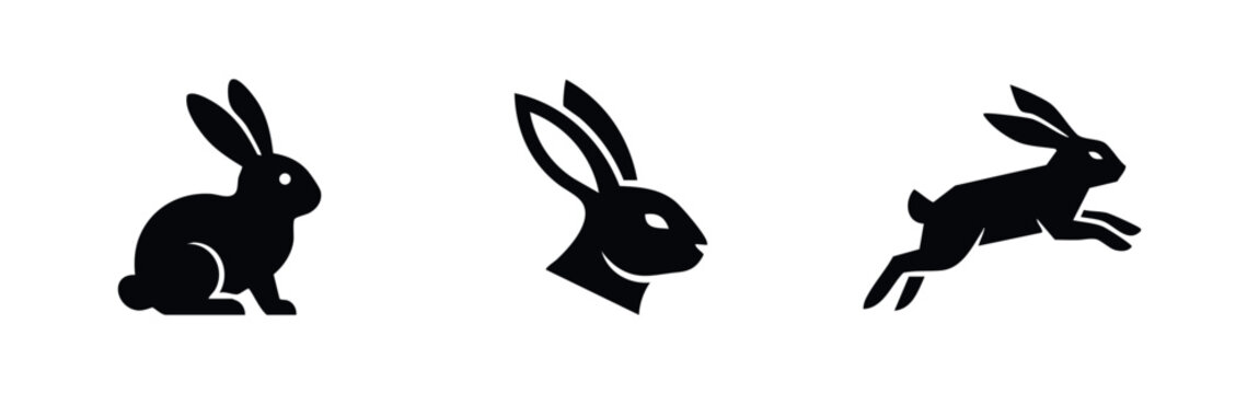 Set of three minimalist black rabbit silhouettes including sitting, head profile, and jumping poses. Modern vector icons for logo and branding.