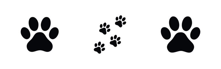 Set of black dog or cat paw print icons and tracks on a white background. Minimalist animal footprint silhouettes for pet shop or veterinary design. © Lili