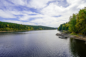 Fototapeta premium View of the Werda Dam near Falkenstein and the surrounding landscape. Nature near Werda in the Vogtland District. 
