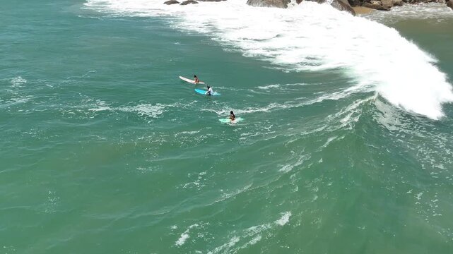 Aerial 4K drone footage of Arugam Bay beach in Sri Lanka. Stunning bird's eye view of surfing