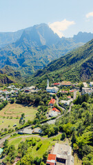 Fototapeta premium Aerial view of Cilaos village mosque and mountains Reunion