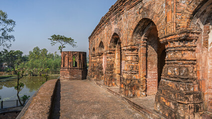 Naklejka premium Scenic perspective view of ancient Hatikumrul Navaratna hindu brick temple upper floor, Sirajganj district, Rajshahi, Bangladesh