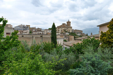 Fototapeta premium View of Capestrano, a historic town surrounded by greenery in Abruzzo, Italy, .