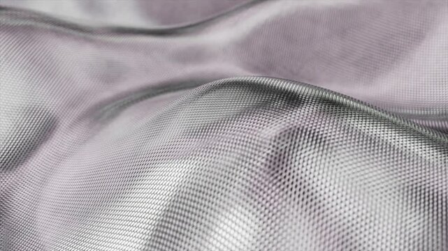 Abstract gray surface made of carbon fiber waving slowly, a perfect background for technology, innovation, and modern industrial concepts with its detailed weave and smooth undulations