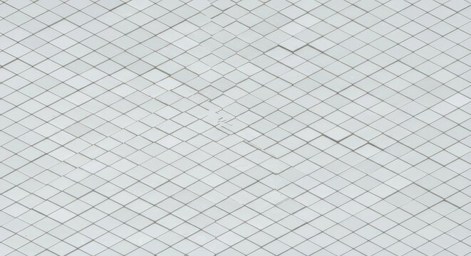 Intricate geometric background featuring uniform small white rhomboid tiles arranged tightly in a complex modern mosaic pattern suitable for architecture, design, backdrop, abstract