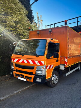job truck orange red white stripes spray