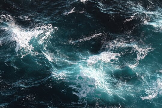 Turbulent Ocean Waves Crashing with White Foam and Deep Blue Water.