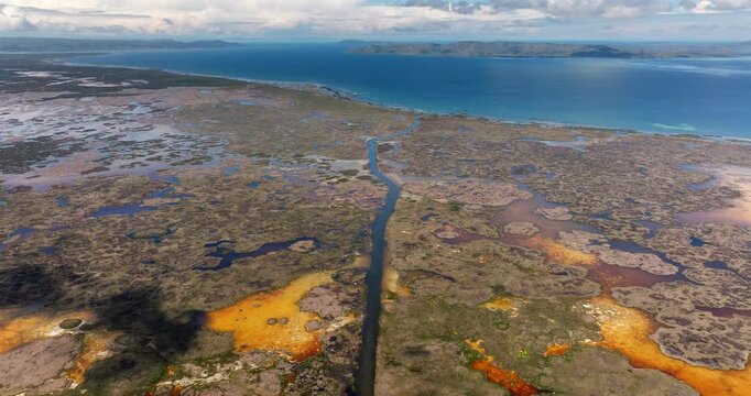 Unique man-made reed floating islands named Uros, home to indigenous Uru people on Lake Titicaca near Puno, Peru. Aerial forward, landscape