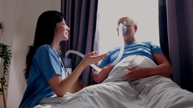 Nurse caregiver supports elderly patient at hospital bedside with oxygen mask, healthcare breathing and recovery nurse adjusts mask and offers calm reassurance during respiratory care near bed