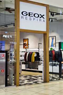 Geox retail store display with clothing and footwear