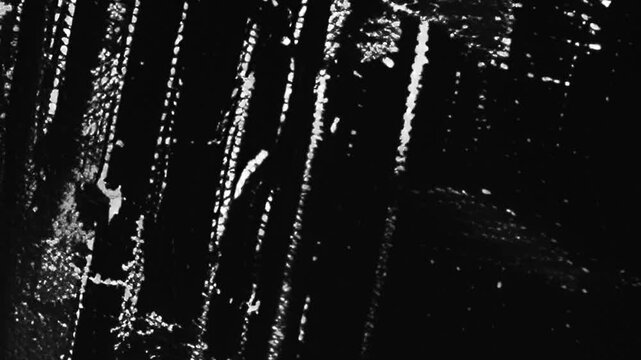 grunge on black background animation 4k footage with scratches animation on black background for damaged vhs overlay and transition for titles and logos
