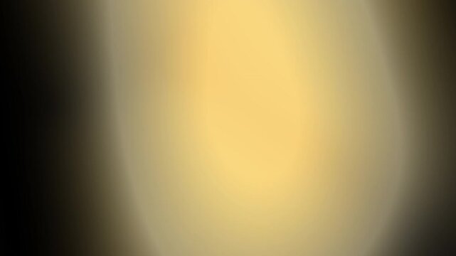 Soft beige gold light leak overlay with gentle warm glow, elegant defocused gradient for luxury branding and wedding video enhancement
