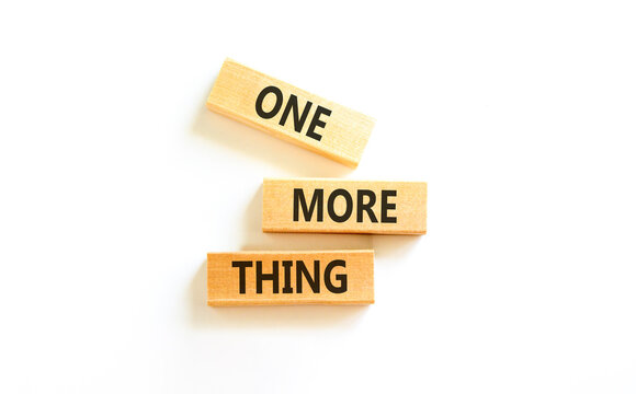 One more thing words symbol. Concept words One more thing on beautiful wooden blocks. Beautiful white background. Business and one more thing concept. Copy space.