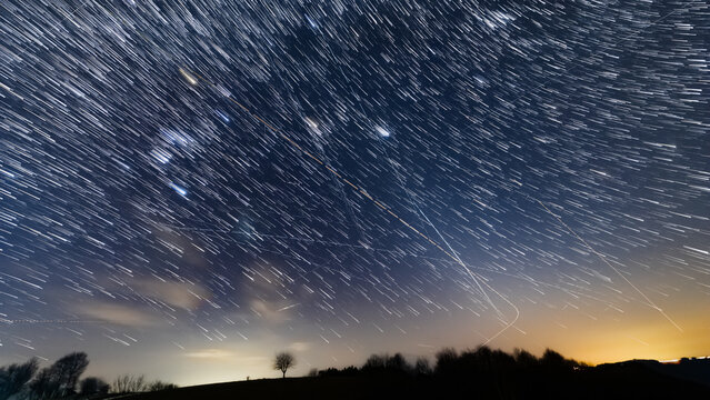 Orion constellation, zodiacal light and Milky Way stars on a dark countryside skies.
