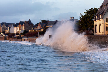 Blow of wind on the cornice of Concarneau, Brittany, France. © gildas