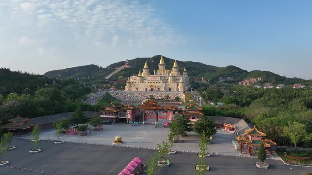 Baolin Temple in Changzhou Jiangsu featuring golden-roofed Buddhist halls and mountainous landscape