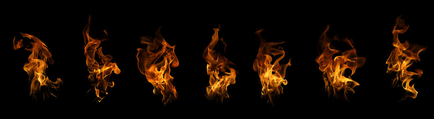 Set of real fire flames and burning blaze isolated on black background. High quality collection of orange fire elements for graphic design, heat energy concept, and hot atmosphere effects. © wasan