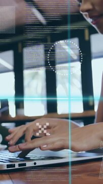 Vertical video: Woman beginning typing on laptop after resting hands, revealing code HUD for coding