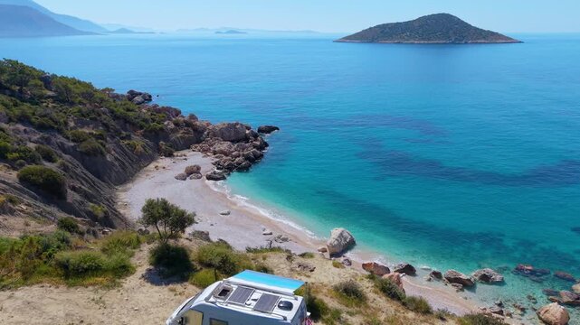 Explore the stunning landscapes of Kas, Turkey, where turquoise waters meet rocky shores. A perfect escape for nature lovers, camping in a camper van or motorhome at the seaside on a cliff