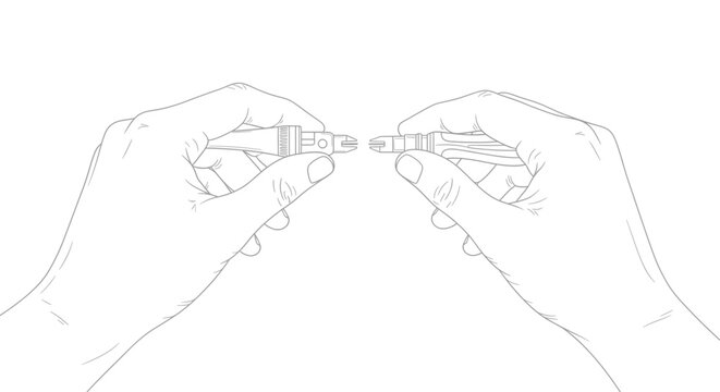 Hands holding small electronic device.