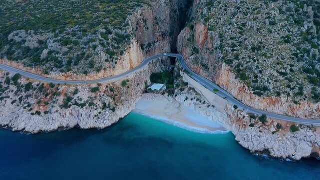 Kaputas Beach Kas Turkey showcase its stunning coastline and turquoise waters. Discover the peaceful beaches, scenic cliffs, and inviting landscape ideal for travel and relaxation.