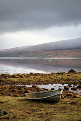 Abandoned Boat on the Shores of a Misty Scottish Loch © Janica