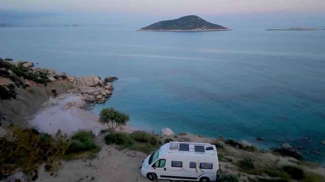 Kas, Turkey, Experience the charm of camping by the coastline and enjoy breathtaking sunsets illuminating the island. camping in a camper van or motorhome at the seaside on a cliff