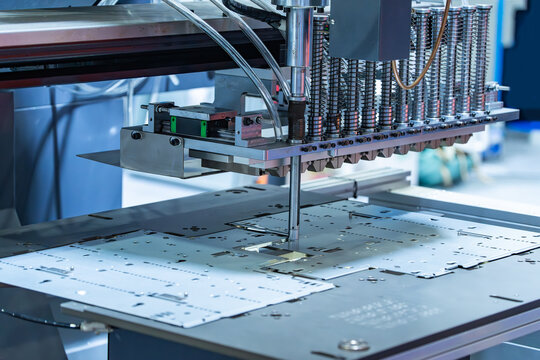 automatic manufacture robot riveting machine. Industrial manufacturing concept.