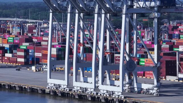 Industrial Shipping towers at Savannah Ports Authority with containers awaiting transport