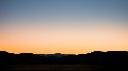 Naklejka premium transition. Horizon at dusk with last sunlight disappearing over vast empty landscape. travel magazines, destination branding, designed for travel destination branding.