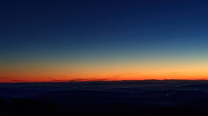 Fototapeta premium transition. Horizon at dusk with last sunlight disappearing over vast empty landscape. travel magazines, destination branding, designed for travel destination branding.