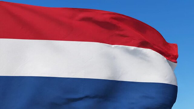 Dutch Flag Waves in Clear Blue Sky