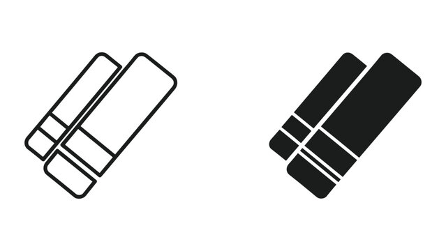 Black and white icons of two credit cards crossed over each other isolated on white background