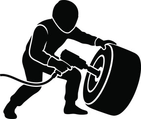 Fototapeta premium Formula one pit stop crew member with impact wrench changing tire.