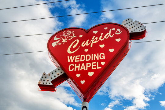 Las Vegas, USA - 17 April 2013: Red heart sign for Cupid's wedding chapel in downtown Las Vegas. The area is famous for elopements, themed and walk in wedding ceremonies.