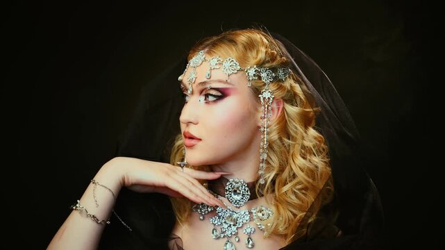 Fantasy girl portrait dark rich queen woman beauty face, luxury elf girl, black dress hood blonde hair creative hairstyle, royal person fashion model posing silver jewelry victorian style. long nails 