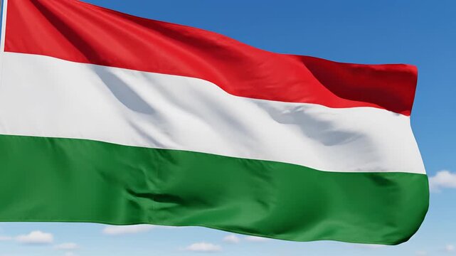 Hungarian Flag Waving Gracefully Against a Clear Blue Sky 1.
