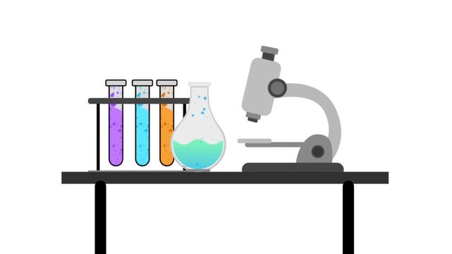 A microscope and glass test tubes with bubbling colorful liquids sit on a laboratory table against a white background.