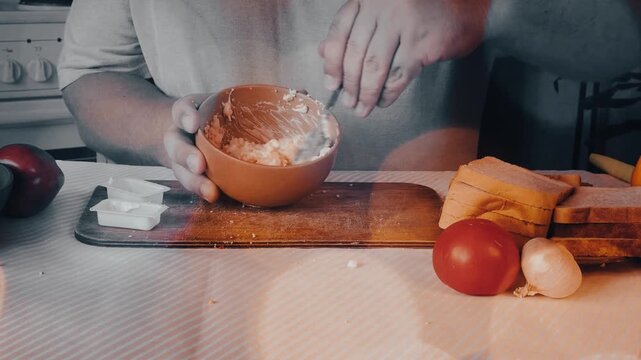 a man is cooking dinner in his kitchen