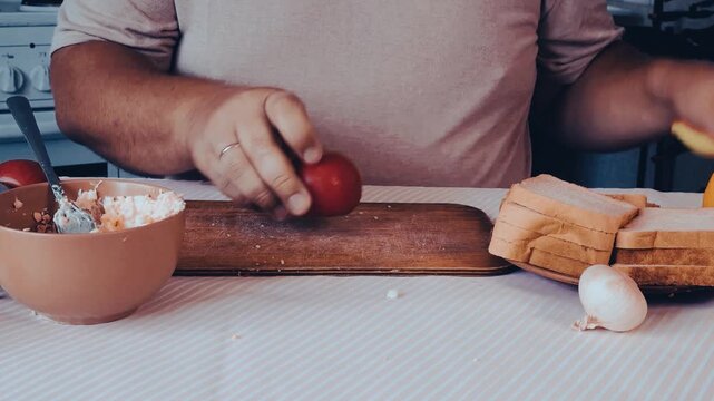a man is cooking dinner in his kitchen