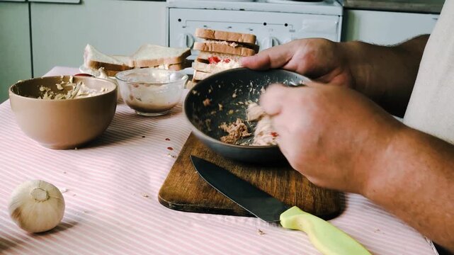 a man is cooking dinner in his kitchen