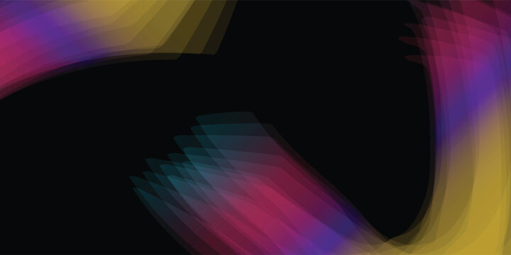 Abstract colorful light trails on black background.