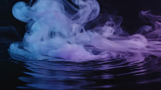 Abstract purple and blue smoke swirls flowing over a dark reflective surface on a black background.